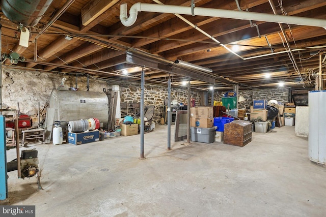 basement featuring water heater