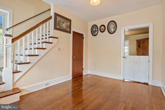 interior space featuring hardwood / wood-style flooring and plenty of natural light