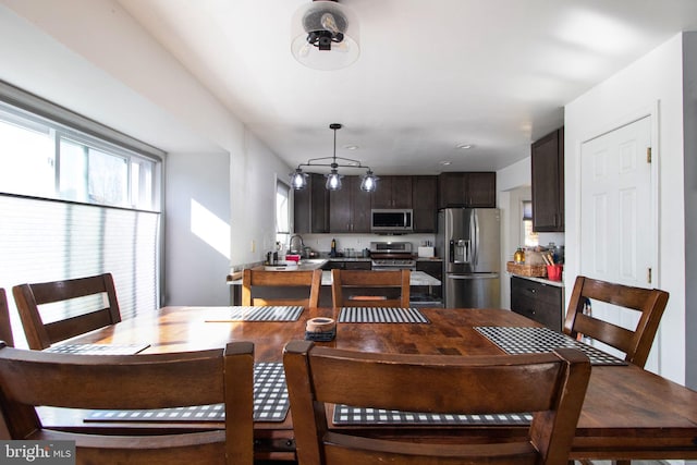 dining space with sink