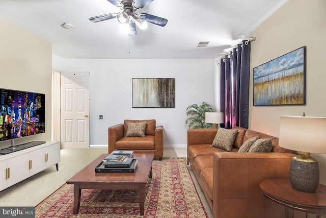 living room featuring ceiling fan