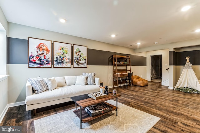 living room with dark hardwood / wood-style flooring