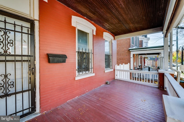 wooden deck with covered porch