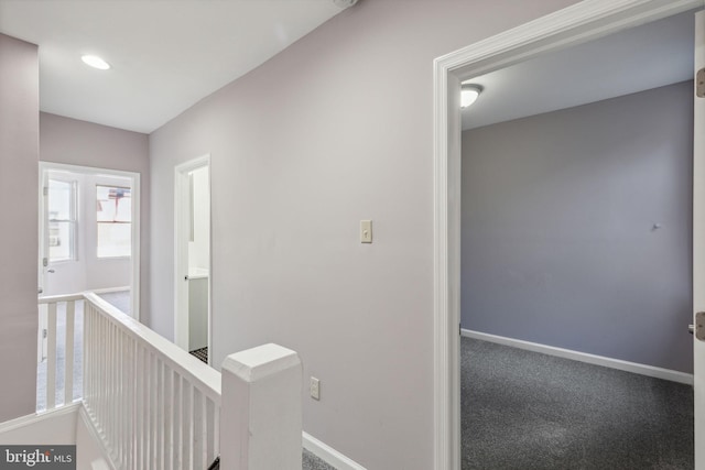 corridor featuring carpet floors