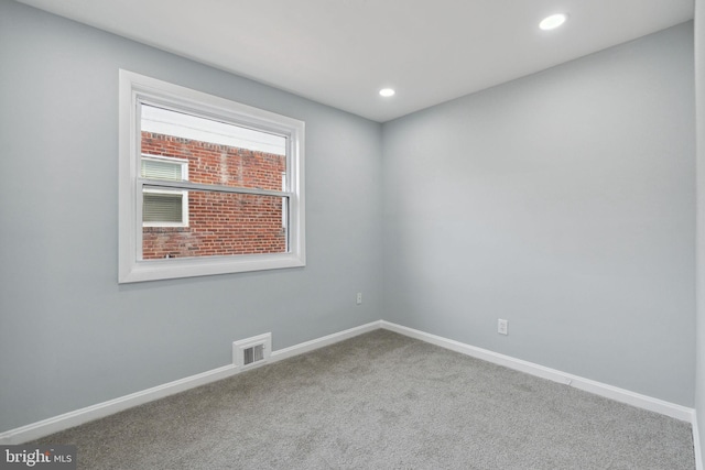 view of carpeted spare room