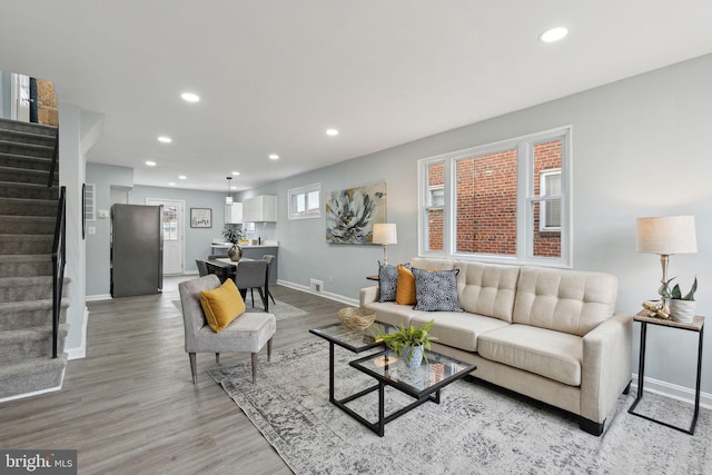 living room with hardwood / wood-style floors