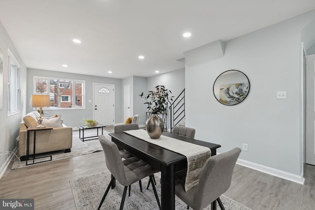 dining area with light hardwood / wood-style floors