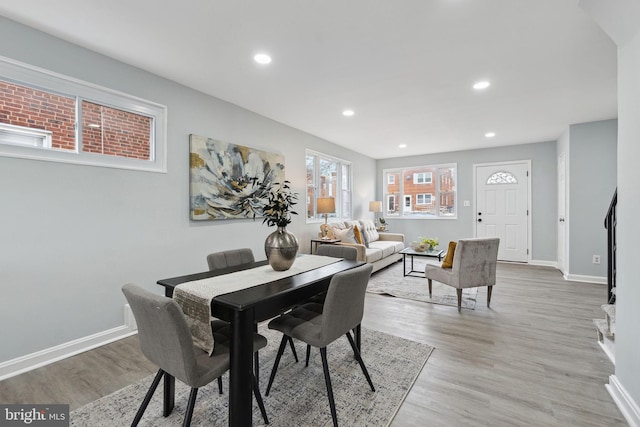 dining area featuring light wood-type flooring