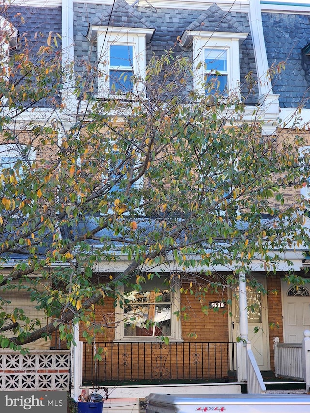 view of home's exterior featuring covered porch