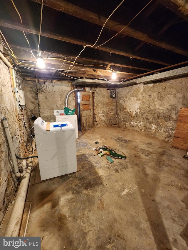 basement featuring washer and dryer