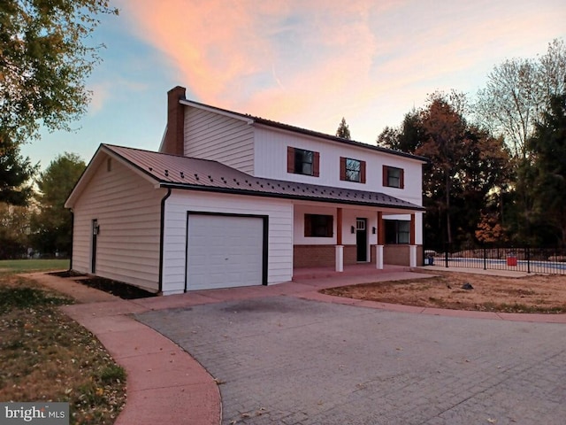 view of property with a garage