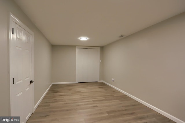 unfurnished room featuring light hardwood / wood-style floors