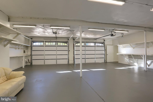 garage featuring a garage door opener