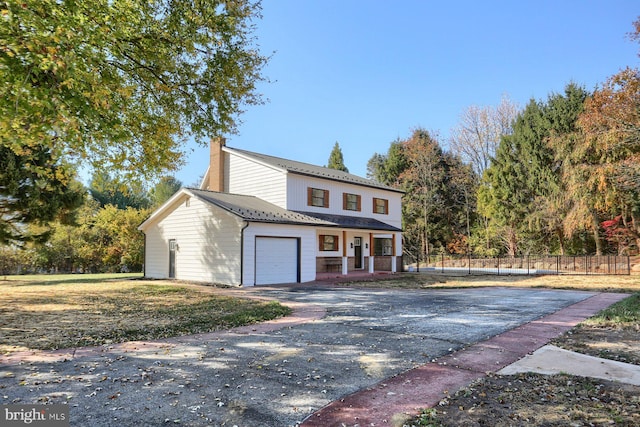 view of property featuring a garage