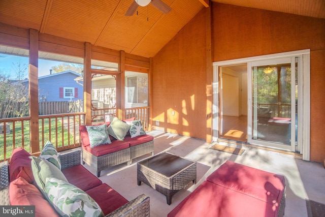 sunroom with lofted ceiling and ceiling fan