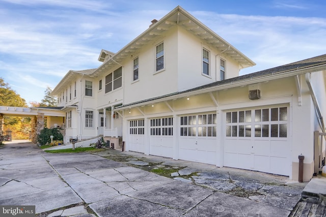 view of property exterior with a garage