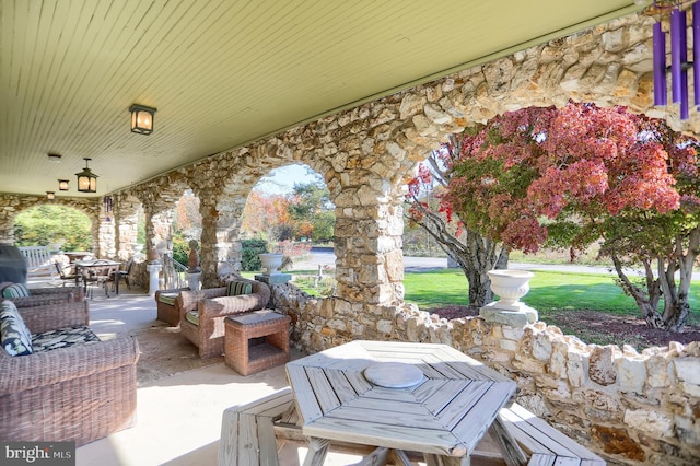 view of patio with outdoor dining area