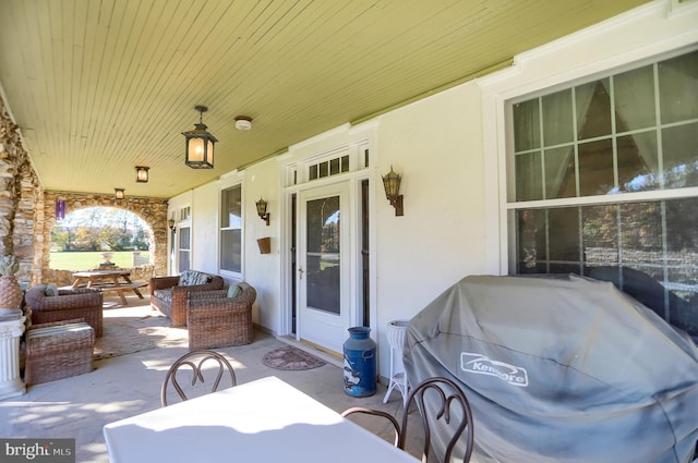 view of patio with covered porch and area for grilling