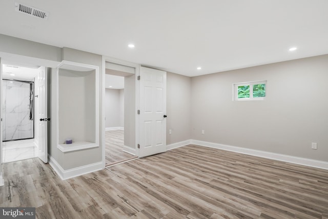 unfurnished bedroom with light hardwood / wood-style floors