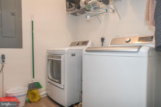 laundry area featuring washer and clothes dryer and electric panel