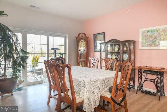 dining room featuring wood-type flooring