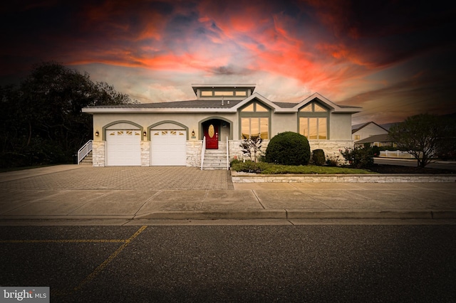 view of front of property featuring a garage