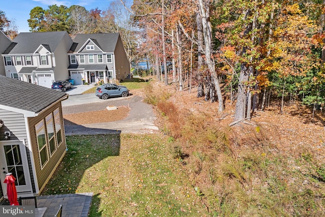 view of yard with a garage