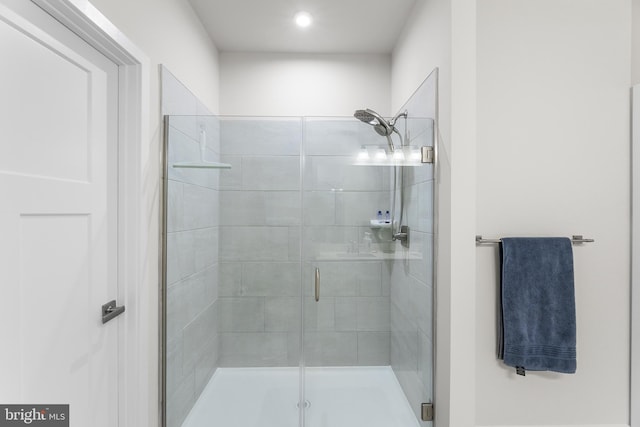 bathroom featuring an enclosed shower