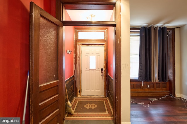 doorway featuring dark hardwood / wood-style floors