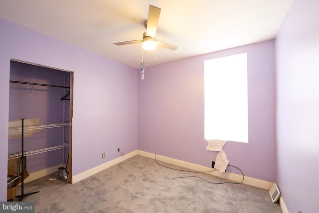 bedroom featuring a closet, carpet floors, and ceiling fan