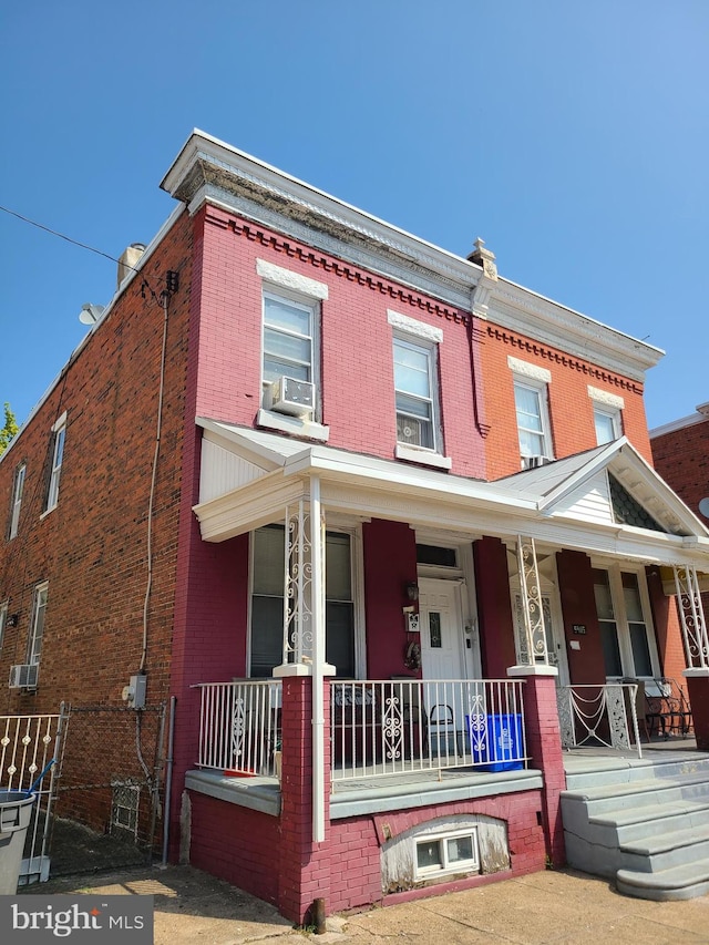 multi unit property with cooling unit and covered porch