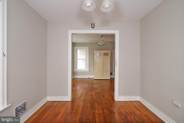 hall featuring dark hardwood / wood-style floors