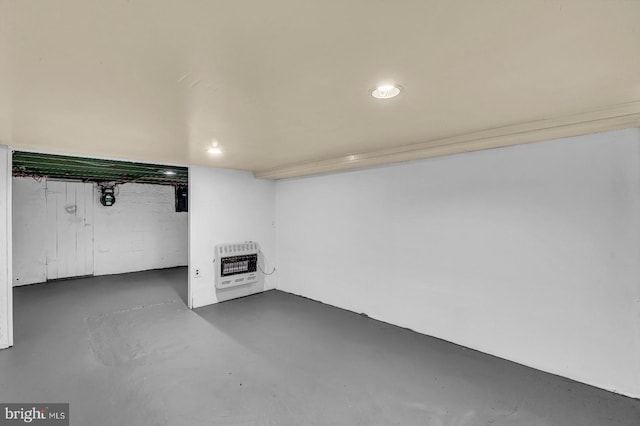 basement featuring heating unit