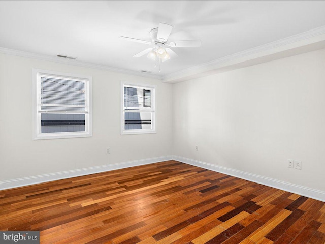 unfurnished room with crown molding, hardwood / wood-style floors, and ceiling fan