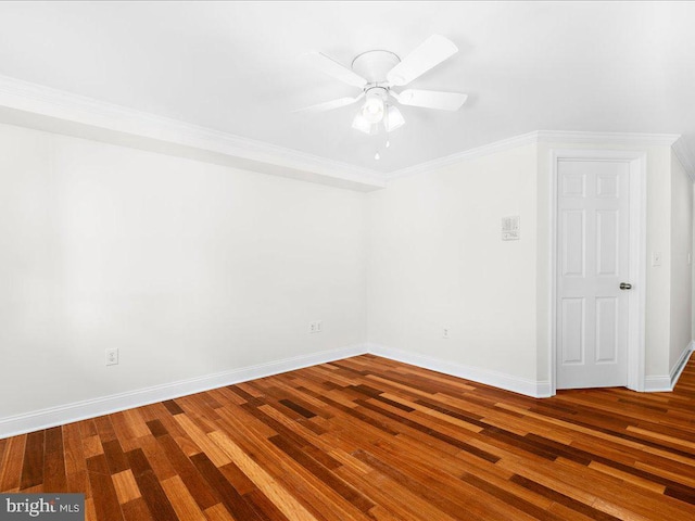 empty room featuring hardwood / wood-style floors, ceiling fan, and crown molding