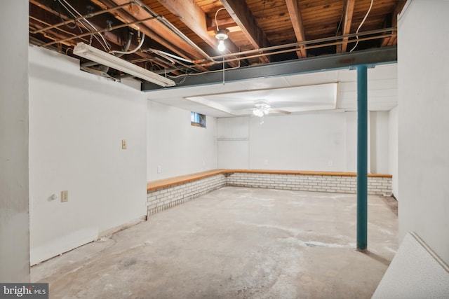 basement featuring ceiling fan