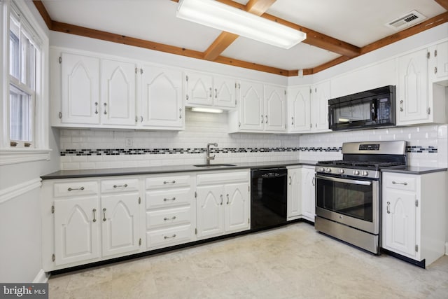 kitchen with beamed ceiling, sink, black appliances, and white cabinets