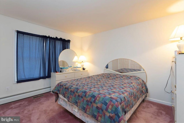 carpeted bedroom featuring baseboard heating