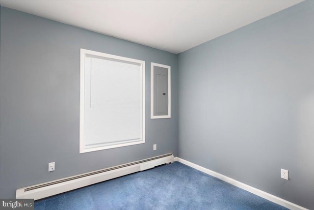 unfurnished room with electric panel, carpet, and a baseboard radiator