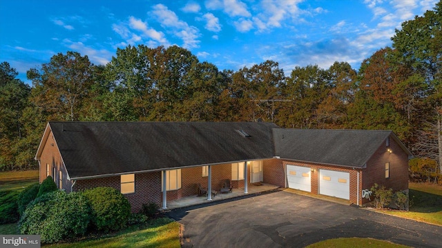 view of front of home featuring a garage