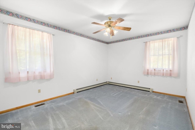 carpeted empty room featuring ceiling fan