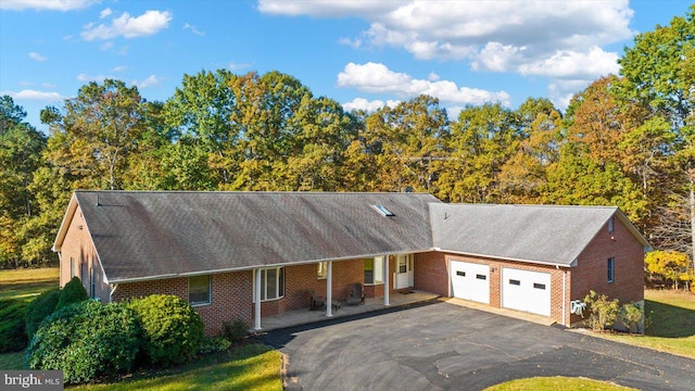 view of front of home featuring a garage