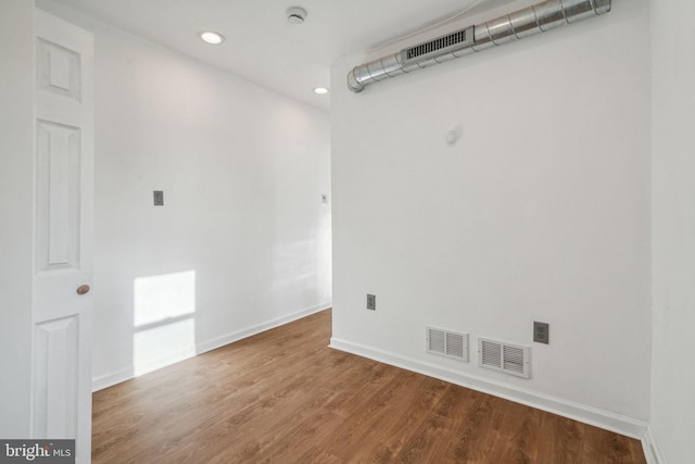 empty room featuring hardwood / wood-style floors