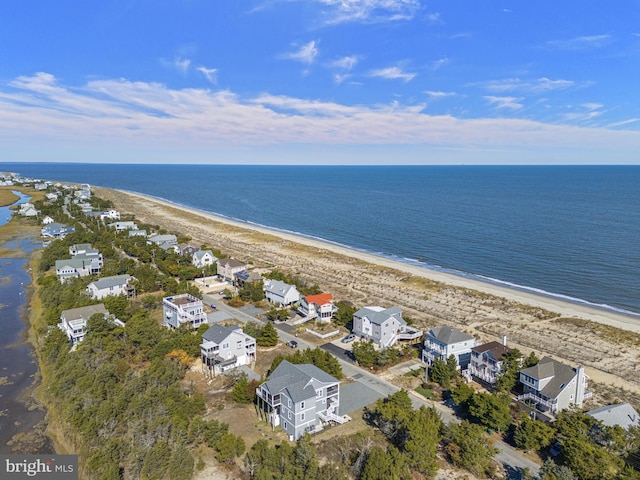 aerial view featuring a water view and a view of the beach