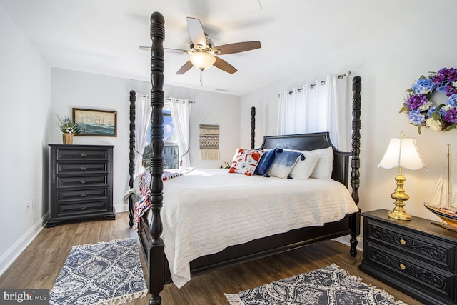 bedroom featuring hardwood / wood-style floors and ceiling fan