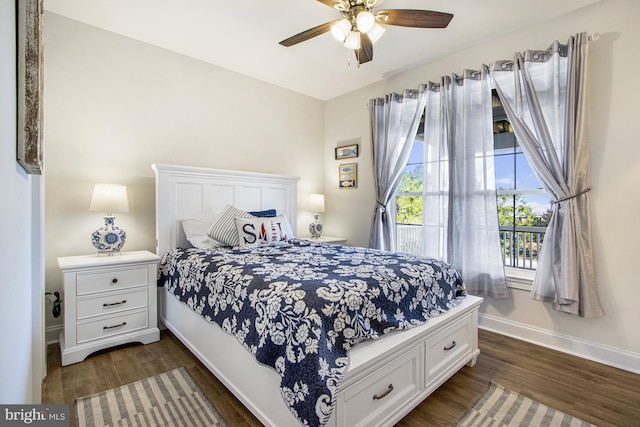 bedroom featuring ceiling fan and dark hardwood / wood-style flooring