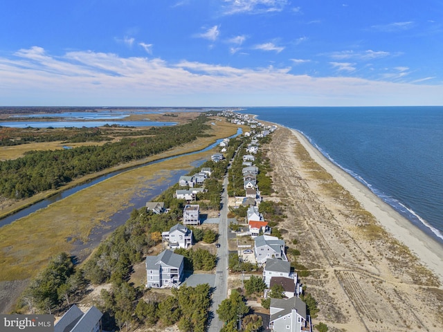 aerial view featuring a water view and a view of the beach