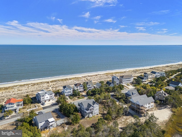 aerial view featuring a water view and a view of the beach