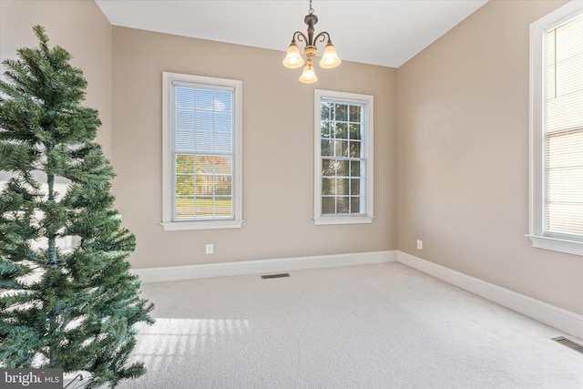 20069 Forest Farm Ln, Ashburn, VA 20147 - spare room featuring an inviting chandelier, visible vents, baseboards, and carpet floors
