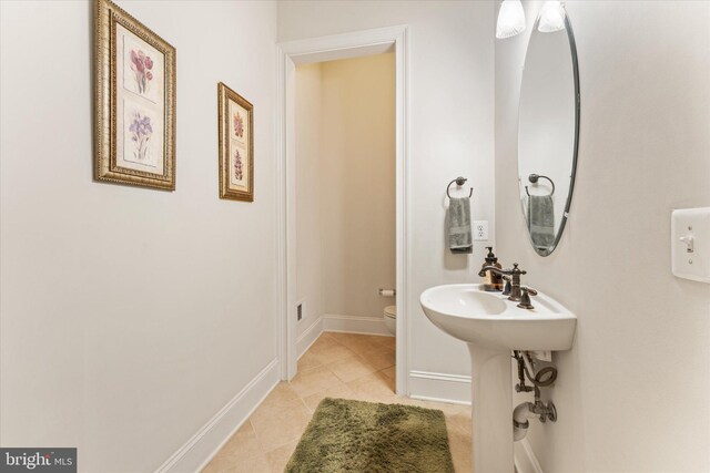 20069 Forest Farm Ln, Ashburn, VA 20147 - bathroom featuring toilet, tile patterned flooring, and baseboards