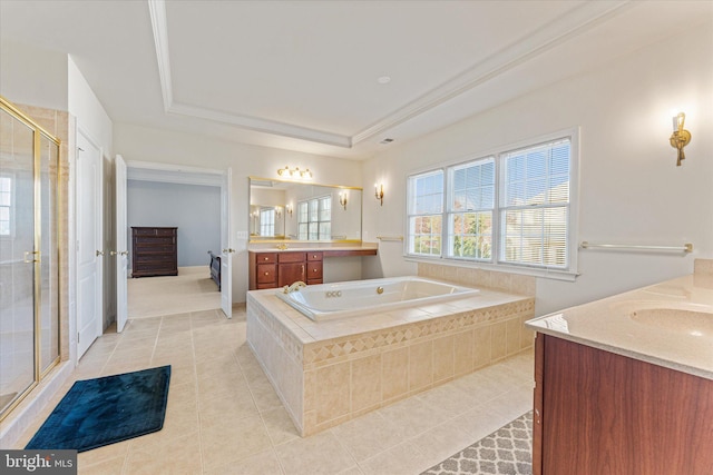 20069 Forest Farm Ln, Ashburn, VA 20147 - full bathroom featuring a bath, tile patterned flooring, a shower stall, a raised ceiling, and vanity